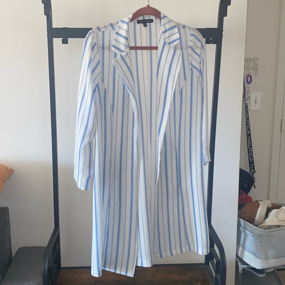 White with blue stripes long blazer. Think shear material.
